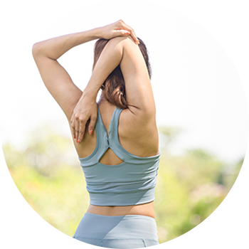 Woman stretching shoulder